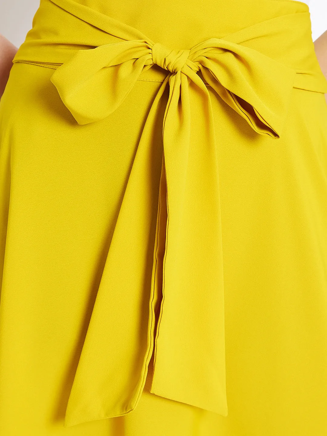 Berrylush Women Solid Yellow Waist Bow Tie-Up Pleated Maxi Skirt