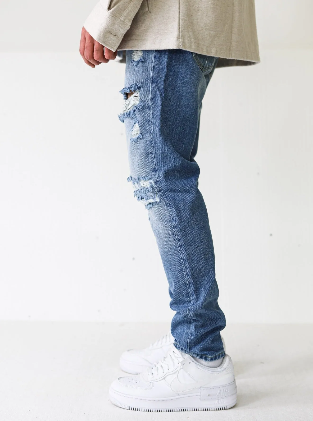 Destroyed Premium Spray On Blue Jeans