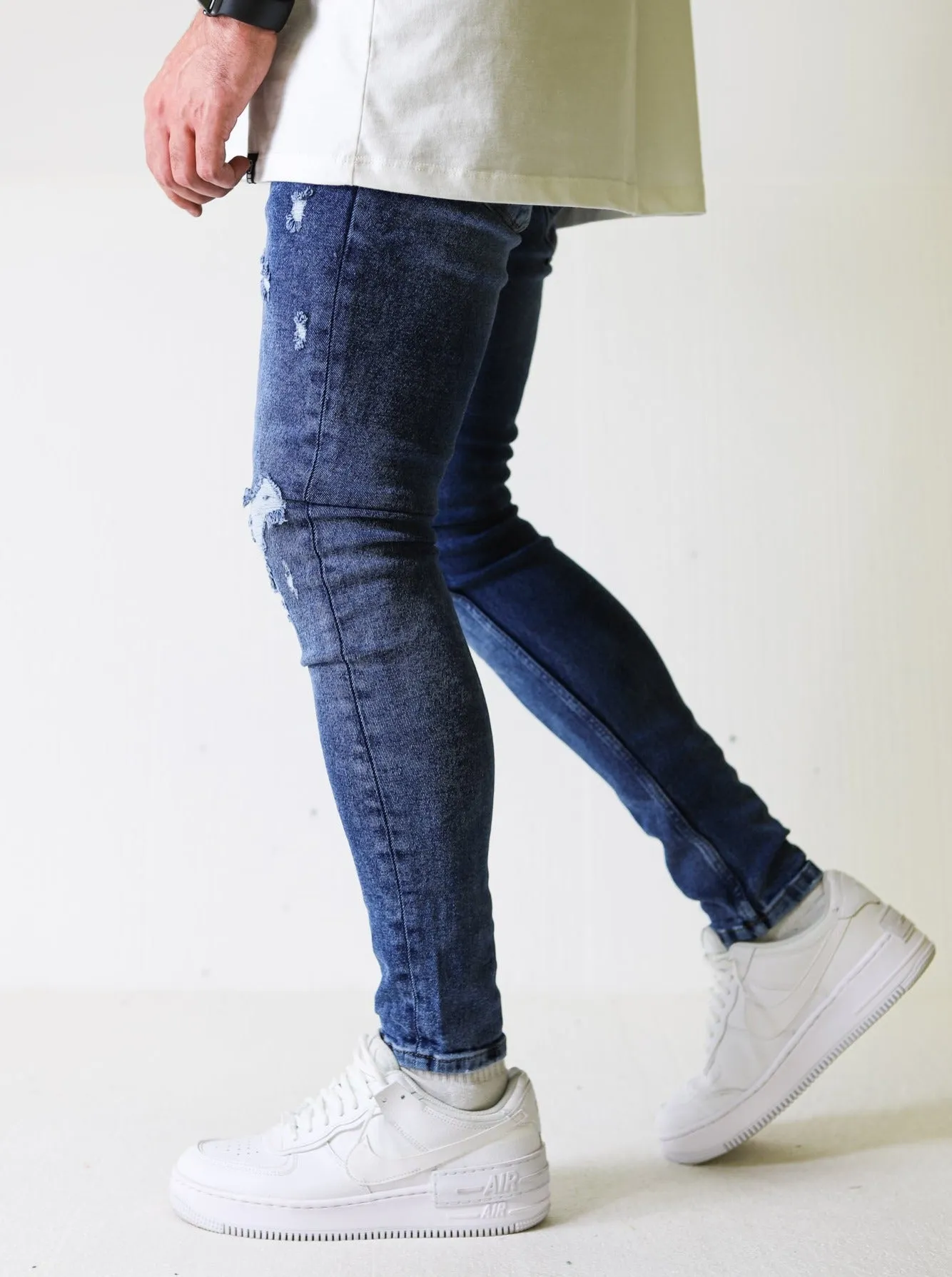 Premium 4X Stretch Claw Ripped Blue Jeans